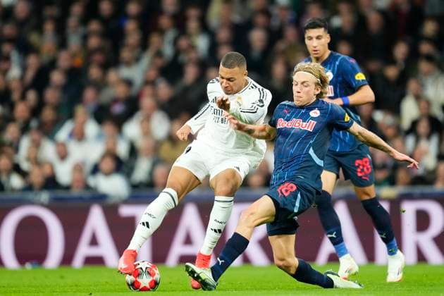 Real Madrid C.F. v FC Salzburg - UEFA Champions League 2024 25 League Phase MD7 Kylian Mbappe centre-forward of Real Madrid and France and Mads Bidstrup central midfield of RB Salzburg and Denmark compete for the ball during the UEFA Champions League 2024 25 League Phase MD7 match between Real Madrid C.F. and FC Salzburg at Estadio Santiago Bernabeu on January 22, 2025 in Madrid, Spain. Madrid Spain  Copyright: xJosexBretonx originalFilename:bretonhernandez-realmadr250122_npvHl.jpg