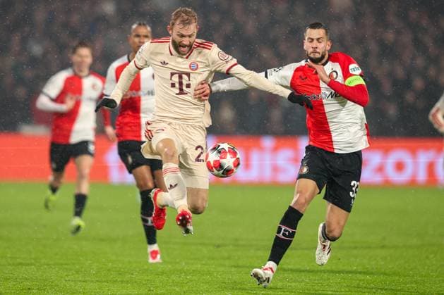 2025-01-22 Feyenoord v FC Bayern Munchen - Champions League - League phase - Matchday 7 ROTTERDAM, NETHERLANDS - JANUARY 22: Konrad Laimer of Bayern Munchen is challenged by David Hancko of Feyenoord during the Champions League - League phase - Matchday 7 match between Feyenoord and FC Bayern Munchen at Stadion Feijenoord on January 22, 2025 in Rotterdam, Netherlands. Rotterdam Stadion Feijenoord Netherlands Content not available for redistribution in The Netherlands directly or indirectly through any third parties. Copyright: xHansxvanxderxValkx