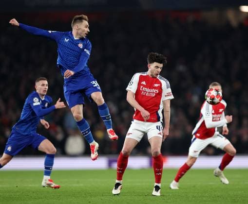 London, England, 22nd January 2025. Arsenal s Declan Rice with Dinamo™s Marko Rog during the UEFA Champions League match at the Emirates Stadium, London. Picture credit should read: David Klein Sportimage EDITORIAL USE ONLY. No use with unauthorised audio, video, data, fixture lists, club league logos or live services. Online in-match use limited to 120 images, no video emulation. No use in betting, games or single club league player publications. SPI_019_DK_Arsneal_Zagreb SPI-3614-0020