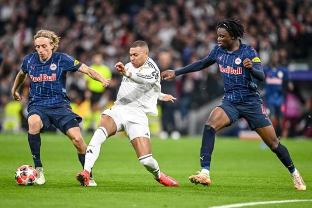 Mads Bidstrup Red Bull Salzburg , Kylian Mbappe Real Madrid CF and Hendry Blank Red Bull Salzburg battle for the ball during the UEFA Champions League 2024 25 League Phase MD7 match between Real Madrid C F and FC Salzburg at Estadio Santiago BernabÃ u on January 22, 2025 in Madrid, Spain Photo by Harry Langer DeFodi Images Defodi 541 REASAL20250122 33 Defodi-541