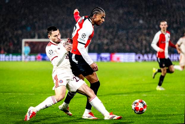SC Bayern Munchen defender Raphael Guerreiro, Feyenoord Rotterdam midfielder Calvin Stengs during the match Feyenoord Bayern Munchen at the Stadium De Kuip for the UEFA Champions League Phase Matchday 7 season 2024 2025 in ROTTERDAM, Netherlands on 22 january 2025, photo by Marcel van Dorst EYE4images DeFodi Images Defodi 746 209879 Defodi-746
