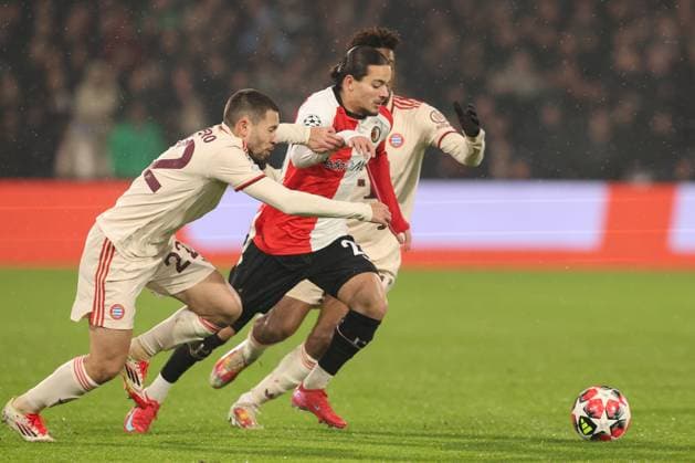 2025-01-22 Feyenoord v FC Bayern Munchen - Champions League - League phase - Matchday 7 ROTTERDAM, NETHERLANDS - JANUARY 22: Anis Hadj Moussa of Feyenoord is challenged by Raphael Guerreiro of FC Bayern Munchen, Kingsley Coman of FC Bayern Munchen during the Champions League - League phase - Matchday 7 match between Feyenoord and FC Bayern Munchen at Stadion Feijenoord on January 22, 2025 in Rotterdam, Netherlands. Rotterdam Stadion Feijenoord Netherlands Content not available for redistribution in The Netherlands directly or indirectly through any third parties. Copyright: xHansxvanxderxValkx