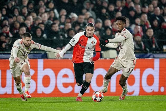 ROTTERDAM, 22-1-2025, Stadium de Kuip, Champions League, 2024 2025, Feyenoord - Bayern Munchen, Feyenoord player Anis Hadj-Moussa vs Bayern Munchen player Raphael Guerreiro Feyenoord - Bayern Munchen  x27514947x Copyright: