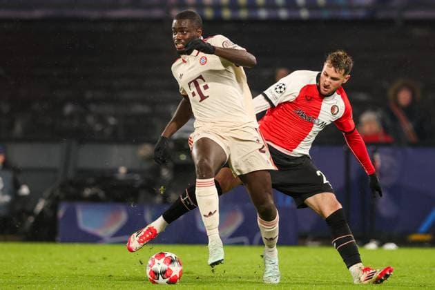 2025-01-22 Feyenoord v FC Bayern Munchen - Champions League - League phase - Matchday 7 ROTTERDAM, NETHERLANDS - JANUARY 22: Santiago Gimenez of Feyenoord battles for the ball with Dayot Upamecano of FC Bayern Munchen during the Champions League - League phase - Matchday 7 match between Feyenoord and FC Bayern Munchen at Stadion Feijenoord on January 22, 2025 in Rotterdam, Netherlands. Rotterdam Stadion Feijenoord Netherlands Content not available for redistribution in The Netherlands directly or indirectly through any third parties. Copyright: xHansxvanxderxValkx