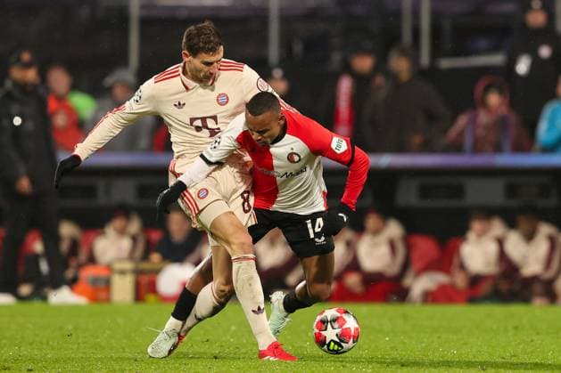 2025-01-22 Feyenoord v FC Bayern Munchen - Champions League - League phase - Matchday 7 ROTTERDAM, NETHERLANDS - JANUARY 22: Igor Paixao of Feyenoord battles for the ball with Leon Goretzka of FC Bayern Munchen during the Champions League - League phase - Matchday 7 match between Feyenoord and FC Bayern Munchen at Stadion Feijenoord on January 22, 2025 in Rotterdam, Netherlands. Rotterdam Stadion Feijenoord Netherlands Content not available for redistribution in The Netherlands directly or indirectly through any third parties. Copyright: xHansxvanxderxValkx