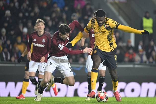 From left Martin Vitik of Sparta, 2nd left and Marcus Thuram of Inter (right) in action during the Football Champions League 7th round match: Sparta Prague vs Inter Milan in Prague, Czech Republic, January 22, 2025. (CTKxPhoto KaterinaxSulova) CTKPhotoP2025012209379  CTKPhotoP2025012209379