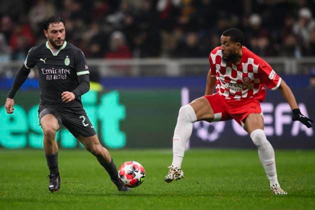AC Milan v Girona FC - UEFA Champion League Davide Calabria of AC Milan comeptes for the ball with Arnaut Danjuma of Girona FC during the UEFA Champions League 2024 25 league phase football match between AC Milan and Girona FC. Milan Italy Copyright: xNicolòxCampox