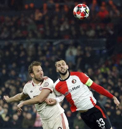 ROTTERDAM - (l-r)Harry Kane of Bayern Munich, David Hancko of Feyenoord during the UEFA Champions League match between Feyenoord and FC Bayern Munich at Feyenoord Stadium de Kuip on Jan. 22, 2025 in Rotterdam, Netherlands. ANP ROBIN VAN LONKHUIJSEN UEFA Champions League 2024 25 League phase 7 2024 25 xVIxANPxSportx xxANPxIVx 518102681 originalFilename: 518102681.jpg