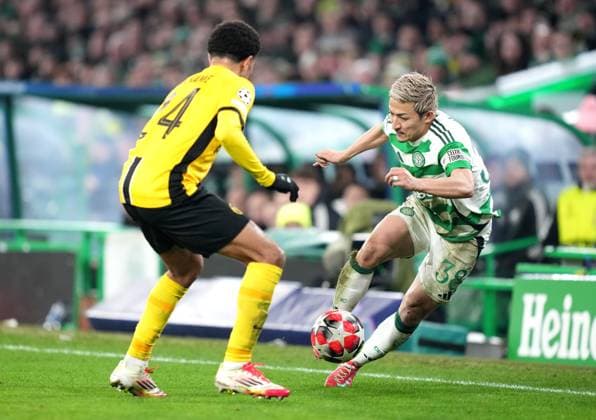 Celtic s Daizen Maeda and Zachsary Athekame of BSC Young Boys during UEFA Champions League - Match Day 7 of 8 between Celtic FC and BSC Young Boys at Celtic Park, on 22nd January 2025 in Glasgow, Scotland. (Picture by Mark Runnacles) Celtic v Young Boys, UEFA Champions League, Group Stage, Football, Celtic Park, Glasgow, UK - 22 Jan 2025 EDITORIAL USE ONLY No use with unauthorised audio, video, data, fixture lists, club league logos or live services. Online in-match use limited to 120 images, no video emulation. No use in betting, games or single club league player publications.  Copyright: xMarkxRunnacles Shutterstockx 15108894eh
