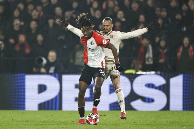 ROTTERDAM - (l-r) Chris-Kevin Nadje of Feyenoord, Leroy Sano of Bayern Munich during the UEFA Champions League match between Feyenoord and FC Bayern Munich at Feyenoord Stadium de Kuip on Jan. 22, 2025 in Rotterdam, Netherlands. ANP MAURICE VAN STEEN UEFA Champions League 2024 25 League phase 7 2024 25 xVIxANPxSportx xxANPxIVx 518107036 originalFilename: 518107036.jpg