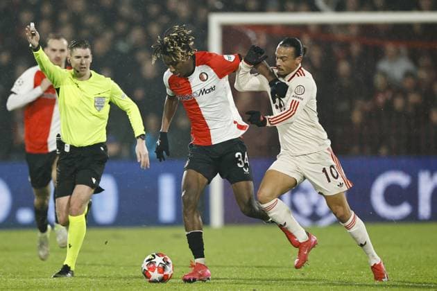 ROTTERDAM - (l-r) Chris-Kevin Nadje of Feyenoord, Leroy Sano of Bayern Munich during the UEFA Champions League match between Feyenoord and FC Bayern Munich at Feyenoord Stadium de Kuip on Jan. 22, 2025 in Rotterdam, Netherlands. ANP MAURICE VAN STEEN UEFA Champions League 2024 25 League phase 7 2024 25 xVIxANPxSportx xxANPxIVx 518107046 originalFilename: 518107046.jpg