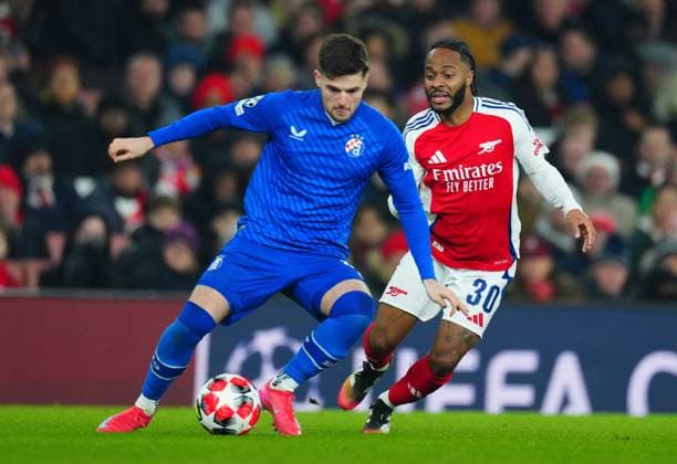 Martin Baturina of Dinamo Zagreb and Raheem Sterling of Arsenal Arsenal v Dinamo Zagreb, UEFA Champions League, Group Stage, Football, Emirates Stadium, London, UK - 22 Jan 2025 EDITORIAL USE ONLY No use with unauthorised audio, video, data, fixture lists, club league logos or live services. Online in-match use limited to 120 images, no video emulation. No use in betting, games or single club league player publications. Copyright: xJavierxGarcia Shutterstockx 15108893cb