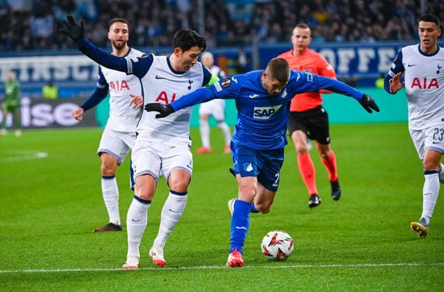 Andrej Kramaric (TSG 1899 Hoffenheim) and Heung-Min Son (Tottenham Hotspur) battle for the ball during the UEFA Europa League 2024 25 League Phase MD7 match between TSG 1899 Hoffenheim v Tottenham Hotspur at PreZero Arena on January 23, 2025 in Hoffenheim, Germany. (Photo by Silas Schueller DeFodi Images) Defodi-738_738_HOFTOT_20250123_135 Defodi-738