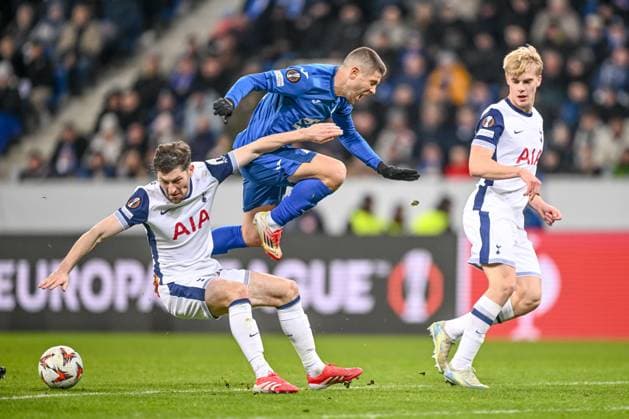 Ben Davies Tottenham Hotspur and Andrej Kramaric TSG 1899 Hoffenheim battle for the ball during the UEFA Europa League 2024 25 League Phase MD7 match between TSG 1899 Hoffenheim v Tottenham Hotspur at PreZero Arena on January 23, 2025 in Hoffenheim, Germany Photo by Harry Langer DeFodi Images Defodi 541 TSGTOT20250123 72 Defodi-541