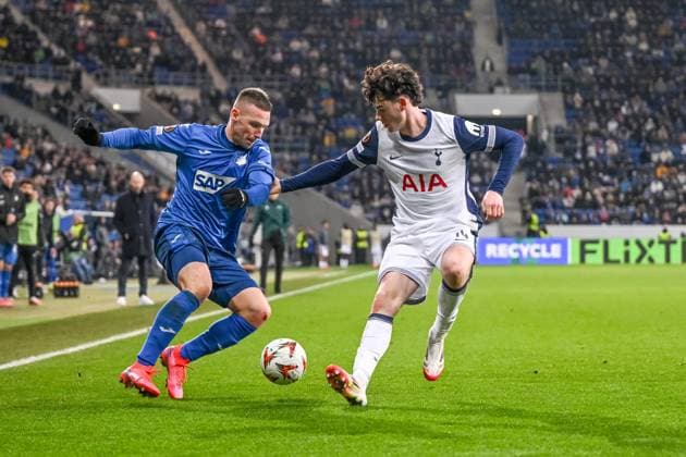 Pavel Kaderabek TSG 1899 Hoffenheim and Archie Gray Tottenham Hotspur battle for the ball during the UEFA Europa League 2024 25 League Phase MD7 match between TSG 1899 Hoffenheim v Tottenham Hotspur at PreZero Arena on January 23, 2025 in Hoffenheim, Germany Photo by Harry Langer DeFodi Images Defodi 541 TSGTOT20250123 80 Defodi-541
