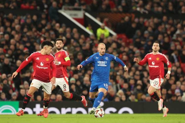 Vaclav Cerny of Rangers and Lisandro Martinez, Diogo Dalot & Bruno Fernandes of Manchester United, ManU during the Europa League group phase match at Old Trafford, Manchester. Manchester United v Rangers, UEFA Europa League, Group Stage, Football, Old Trafford, Manchester, UK - 23 Jan 2025 EDITORIAL USE ONLY No use with unauthorised audio, video, data, fixture lists, club league logos or live services. Online in-match use limited to 120 images, no video emulation. No use in betting, games or single club league player publications. Copyright: xRangersxFC Shutterstockx 15111693dc