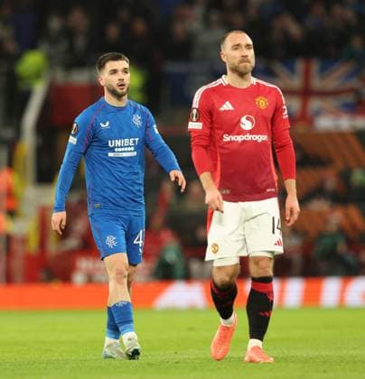 Nicolas Raskin of Rangers and Christian Erikson of Manchester United, ManU during the Europa League group phase match at Old Trafford, Manchester. Manchester United v Rangers, UEFA Europa League, Group Stage, Football, Old Trafford, Manchester, UK - 23 Jan 2025 EDITORIAL USE ONLY No use with unauthorised audio, video, data, fixture lists, club league logos or live services. Online in-match use limited to 120 images, no video emulation. No use in betting, games or single club league player publications. Copyright: xRangersxFC Shutterstockx 15111693di