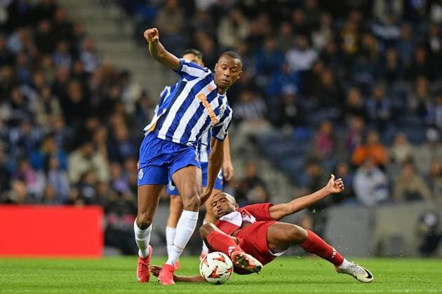 23rd January 2025, Dragao Stadium, Porto, Portugal: Europa League FC Porto versus Olympiacos; Tiago Djalo of FC Porto tussles for possession ball with Ayoub El Kaabi of Olympiacos, during the UEFA Europa League match between Fc Porto and Olympiacos  ActionPlus12742322 DanielxCastro