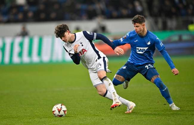 duel, action Archie Gray Tottenham Hotspur Spurs 14 vs Adam Hlozek TSG 1899 Hoffenheim 23 TSG 1899 Hoffenheim vs Tottenham Hotspur Spurs 23 01 2025 DFL REGULATIONS PROHIBIT ANY USE OF PHOTOGRAPHS AS IMAGE SEQUENCES AND OR QUASI VIDEO TSG 1899 Hoffenheim vs Tottenham Hotspur