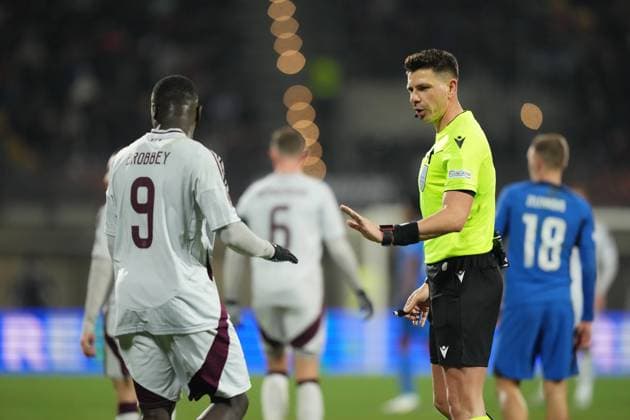 RIGA, 23-01-2025 , Daugava Stadium , football, UEFA Europa League, season 2024 2025, Match between RFS and Ajax. Ajax player Brian Brobbey and referee Marian Barbu (ROE) RFS - Ajax  x27528365x Copyright: