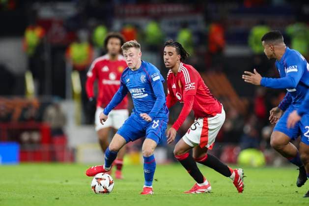 Manchester United, ManU FC v Glasgow Rangers FC Glasgow Rangers midfielder Connor Barron (8) battles with Manchester United defender Leny Yoro (15) during the Manchester United FC v Glasgow Rangers FC UEFA Europa League Round 1 match at Old Trafford, Manchester, England, United Kingdom on 23 January 2025 Credit: Phil Duncan Every Second Media Editorial use only. All images are copyright Every Second Media Limited. No images may be reproduced without prior permission. Copyright: xIMAGO EveryxSecondxMediax ESM-1295-0018