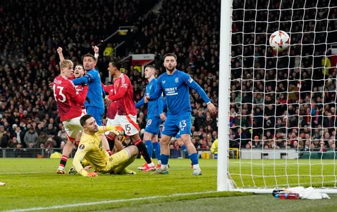Manchester, England, 23rd January 2025. Jack Butland of Rangers (grounded) punches the ball into his own net during the UEFA Europa League match at Old Trafford, Manchester. Picture credit should read: Andrew Yates Sportimage EDITORIAL USE ONLY. No use with unauthorised audio, video, data, fixture lists, club league logos or live services. Online in-match use limited to 120 images, no video emulation. No use in betting, games or single club league player publications. SPI_019_AY_MAN_UTD_RANGERS SPI-3616-0019