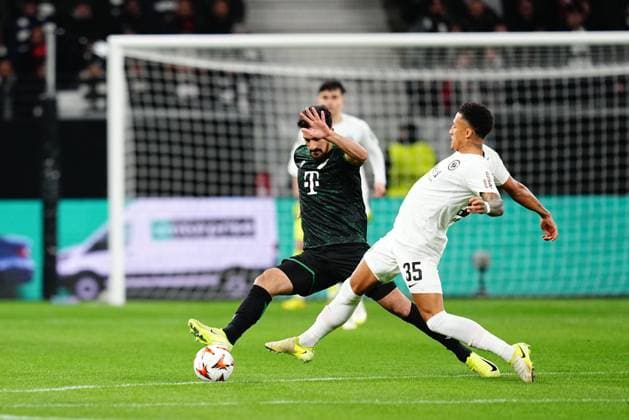 January 23 2025: Mohamed Ali Ben Romdhane (Ferencvaarosi TC) and Tuta (Eintracht Frankfurt) battle for the ball during a UEFA Europa League MD7 game, Eintracht Frankfurt vs Ferencvaros, at Deutsche Bank Park, Frankfurt, Germany. Ulrik Pedersen - ZUMAc04_ 20250123_zma_c04_025 Copyright: xCSMx