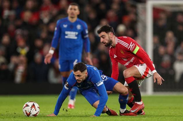 Nedim Bajrami of Rangers is challenged by Bruno Fernandes of Manchester United, ManU Manchester United v Rangers, UEFA Europa League, Group Stage, Football, Old Trafford, Manchester, UK - 23 Jan 2025 EDITORIAL USE ONLY No use with unauthorised audio, video, data, fixture lists, club league logos or live services. Online in-match use limited to 120 images, no video emulation. No use in betting, games or single club league player publications. Copyright: xPaulxCurrie Shutterstockx 15108899dd