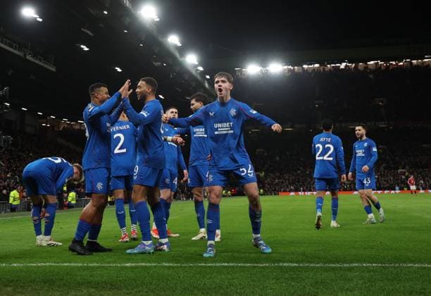 Cyriel Dessers of Rangers celebrates scoring to make it 1-1 Manchester United, ManU v Rangers, UEFA Europa League, Group Stage, Football, Old Trafford, Manchester, UK - 23 Jan 2025 EDITORIAL USE ONLY No use with unauthorised audio, video, data, fixture lists, club league logos or live services. Online in-match use limited to 120 images, no video emulation. No use in betting, games or single club league player publications. Copyright: xPaulxCurrie Shutterstockx 15108899hy