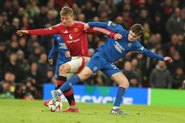 Rasmus Hojlund of Manchester United, ManU and Findlay Curtis of Rangers during the Europa League group phase match at Old Trafford, Manchester. Manchester United v Rangers, UEFA Europa League, Group Stage, Football, Old Trafford, Manchester, UK - 23 Jan 2025 EDITORIAL USE ONLY No use with unauthorised audio, video, data, fixture lists, club league logos or live services. Online in-match use limited to 120 images, no video emulation. No use in betting, games or single club league player publications. Copyright: xRangersxFC Shutterstockx 15111693md