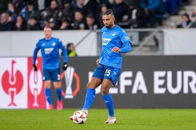 Kevin Akpoguma Hoffenheim, 25 , on the ball, cropped, full body, single image, single photo, action, action, 23 01 2025, Sinsheim Germany , football, UEFA Europa League, group stage, TSG 1899 Hoffenheim Tottenham Hotspur, DFB DFL REGULATIONS PROHIBIT ANY USE OF PHOTOGRAPHS AS IMAGE SEQUENCES AND OR QUASI VIDEO xozx