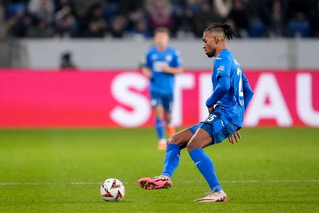 Kevin Akpoguma Hoffenheim, 25 , on the ball, cropped, full body, single image, single photo, action, action, 23 01 2025, Sinsheim Germany , football, UEFA Europa League, group stage, TSG 1899 Hoffenheim Tottenham Hotspur, DFB DFL REGULATIONS PROHIBIT ANY USE OF PHOTOGRAPHS AS IMAGE SEQUENCES AND OR QUASI VIDEO xozx