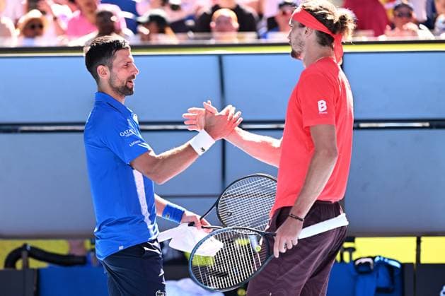 TENNIS AUSTRALIAN OPEN, Novak Djokovic of Serbia shakes hands with Alexander Zverev of Germany after retiring and loosing the first set, during his semi-final match during the 2025 Australian Open at Melbourne Park in Melbourne, Friday, January 24, 2025. ( NO ARCHIVING, EDITORIAL USE ONLY, NO USE IN BOOKS WITHOUT CONSENT MELBOURNE VICTORIA AUSTRALIA  Copyright: xJAMESxROSSx 20250124153218632878