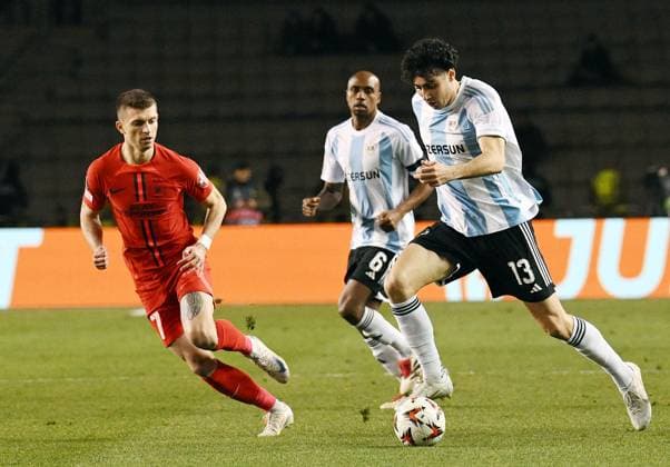 (250124) -- BAKU, Jan. 24, 2025 -- Florin Tanase (L) of FCSB vies with Bahlul Mustafazade (R) of Qarabag during a UEFA Europa League match between Qarabag and FCSB in Baku, Azerbaijan, Jan. 23, 2025. (Photo by v Xinhua) (SP)AZERBAIJAN-BAKU-FOOTBALL-UEFA EUROPA LEAGUE-QARABAG VS FCSB TofikxBabaye 