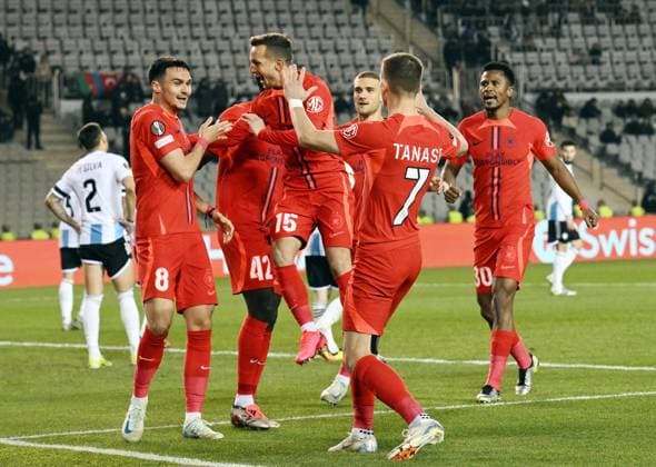 (250124) -- BAKU, Jan. 24, 2025 -- Players of FCSB celebrate during a UEFA Europa League match between Qarabag and FCSB in Baku, Azerbaijan, Jan. 23, 2025. (Photo by v Xinhua) (SP)AZERBAIJAN-BAKU-FOOTBALL-UEFA EUROPA LEAGUE-QARABAG VS FCSB TofikxBabaye 
