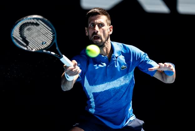 (250124) -- MELBOURNE, Jan. 24, 2025 -- Novak Djokovic hits a return during the men s singles semifinals between Novak Djokovic of Serbia and Alexander Zverev of Germany at Australian Open tennis tournament in Melbourne, Australia, Jan. 24, 2025. ) (SP)AUSTRALIA-MELBOURNE-TENNIS-AUSTRALIAN OPEN-MEN S SINGLES-SEMIFINALS MaxPing 