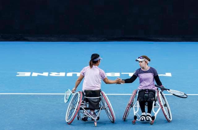(250124) -- MELBOURNE, Jan. 24, 2025 -- Zhu Zhenzhen (L) Tanaka Manami react during the women s wheelchair doubles final between Wang Ziying Li Xiaohui of China and Zhu Zhenzhen (China) Tanaka Manami (Japan) at Australian Open tennis tournament in Melbourne, Australia, Jan. 24, 2025. ) (SP)AUSTRALIA-MELBOURNE-TENNIS-AUSTRALIAN OPEN-WOMEN S WHEELCHAIR DOUBLES-FINAL MaxPing 