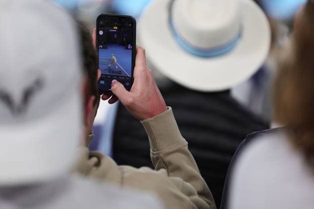 Fans take pictures of the Ben Shelton v Jannik Sinner Semi-final match in the Rod Laver Arena Australian Open, Day Thirteen, Tennis, Melbourne Park, Melbourne, Australia - 24 Jan 2025  Copyright: xRachelxBach Shutterstockx 15108800fw