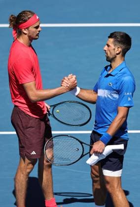 Alexander Zverev, GER, and Novak Djokovic, SRB, after retirement due to injury during semifinals of 2025 Australian Open in Melbourne, 24 01 2025