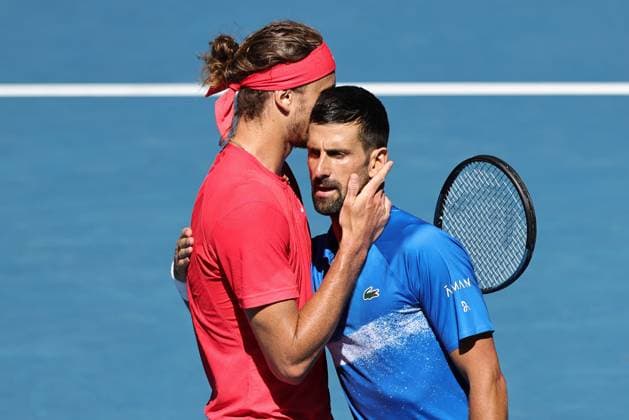 Alexander Zverev, GER, and Novak Djokovic, SRB, after retirement due to injury during semifinals of 2025 Australian Open in Melbourne, 24 01 2025