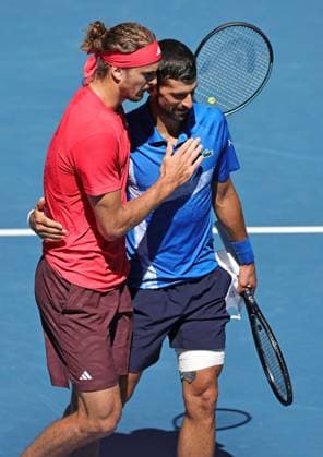 Alexander Zverev, GER, and Novak Djokovic, SRB, after retirement due to injury during semifinals of 2025 Australian Open in Melbourne, 24 01 2025