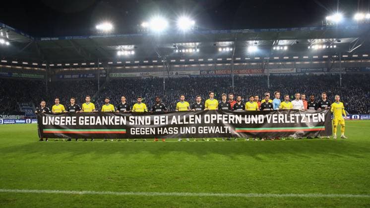 24 01 2025, xgox, Soccer 2 Bundesliga, 1 FC Magdeburg Eintracht Braunschweig emspor, v l banner banner, commemoration of the attack on the Christmas market in Magdeburg on 20 12 2024 DFL DFB REGULATIONS PROHIBIT ANY USE OF PHOTOGRAPHS as IMAGE SEQUENCES and or QUASI VIDEO Magdeburg