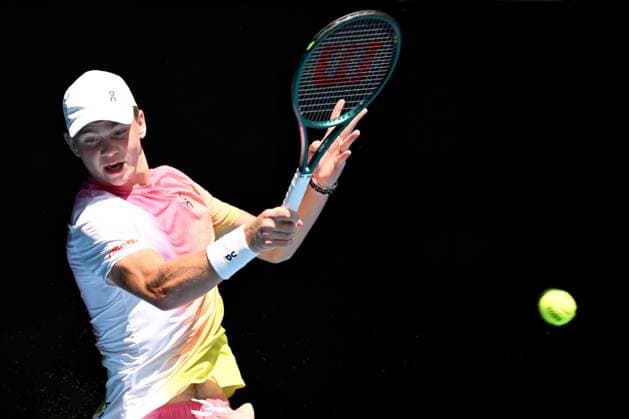 TENNIS AUSTRALIAN OPEN, Henry Bernet of Switzerland returns during his Junior Boys Singles final against Benjamin Willwerth of the USA during the 2025 Australian Open at Melbourne Park in Melbourne, Saturday, January 25, 2025. ( NO ARCHIVING, EDITORIAL USE ONLY, NO USE IN BOOKS WITHOUT CONSENT MELBOURNE VICTORIA AUSTRALIA  Copyright: xJAMESxROSSx 20250125141992095124