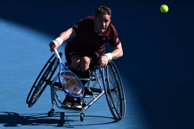 TENNIS AUSTRALIAN OPEN, Alfie Hewett of the United Kingdom serves during his Men?s Wheelchair Singles final against Tokito Oda of Japan during the 2025 Australian Open at Melbourne Park in Melbourne, Saturday, January 25, 2025. ( NO ARCHIVING, EDITORIAL USE ONLY, NO USE IN BOOKS WITHOUT CONSENT MELBOURNE VICTORIA AUSTRALIA  Copyright: xJOELxCARRETTx 20250125112563994332