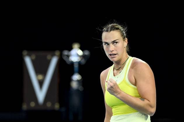 TENNIS AUSTRALIAN OPEN, Aryna Sabalenka of Belarus celebrates with the Daphne Arkhurst Memorial Cup seen in the background during her Women?s final against Madison Keys of the USA during the 2025 Australian Open at Melbourne Park in Melbourne, Saturday, January 25, 2025. ( NO ARCHIVING, EDITORIAL USE ONLY, NO USE IN BOOKS WITHOUT CONSENT MELBOURNE VICTORIA AUSTRALIA  Copyright: xJOELxCARRETTx 20250125140203011899