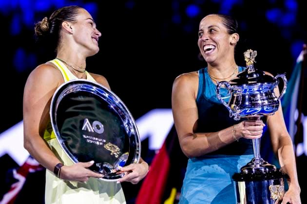 MELBOURNE, VIC - JANUARY 25: Madison Keys of the United States of America and Aryna Sabalenka of Belarus hold their respective trophies at the end of their Women s Singles Finals match of the 2025 Australian Open on January 25 2025, at Melbourne Park in Melbourne, Australia. (Photo by Jason Heidrich Icon Sportswire) TENNIS: JAN 25 Australian Open EDITORIAL USE ONLY Icon250125012