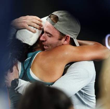(250125) -- MELBOURNE, Jan. 25, 2025 -- Madison Keys (L) hugs her coach and husband Bjorn Fratangelo after the women s singles final between Aryna Sabalenka of Belarus and Madison Keys of the United States at Australian Open tennis tournament in Melbourne, Australia, Jan. 25, 2025. ) (SP)AUSTRALIA-MELBOURNE-TENNIS-AUSTRALIAN OPEN-WOMEN S SINGLES-FINAL MaxPing 