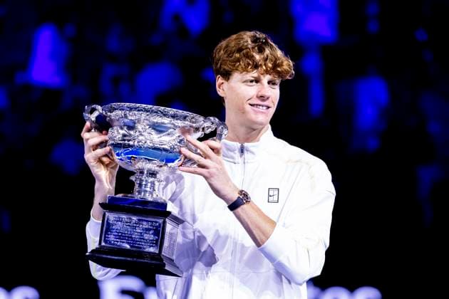 MELBOURNE, VIC - JANUARY 26: Jannik Sinner of italy raises the Norman Brookes Challenge Cup after winning the Men s Singles Final of the 2025 Australian Open on January 26 2025, at Melbourne Park in Melbourne, Australia. (Photo by Jason Heidrich Icon Sportswire) TENNIS: JAN 26 Australian Open EDITORIAL USE ONLY Icon250126006