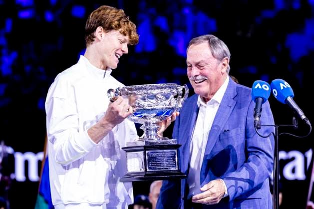 MELBOURNE, VIC - JANUARY 26: Jannik Sinner of italy receives the Norman Brookes Challenge Cup from John Newcombe after winning the Men s Singles Final of the 2025 Australian Open on January 26 2025, at Melbourne Park in Melbourne, Australia. (Photo by Jason Heidrich Icon Sportswire) TENNIS: JAN 26 Australian Open EDITORIAL USE ONLY Icon250126007
