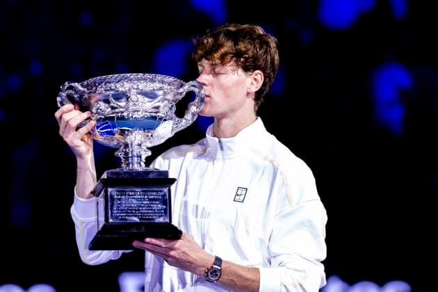 MELBOURNE, VIC - JANUARY 26: Jannik Sinner of italy kisses the the Norman Brookes Challenge Cup after winning the Men s Singles Final of the 2025 Australian Open on January 26 2025, at Melbourne Park in Melbourne, Australia. (Photo by Jason Heidrich Icon Sportswire) TENNIS: JAN 26 Australian Open EDITORIAL USE ONLY Icon250126001